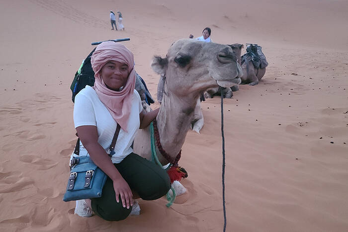 Veronique Wright with a camel