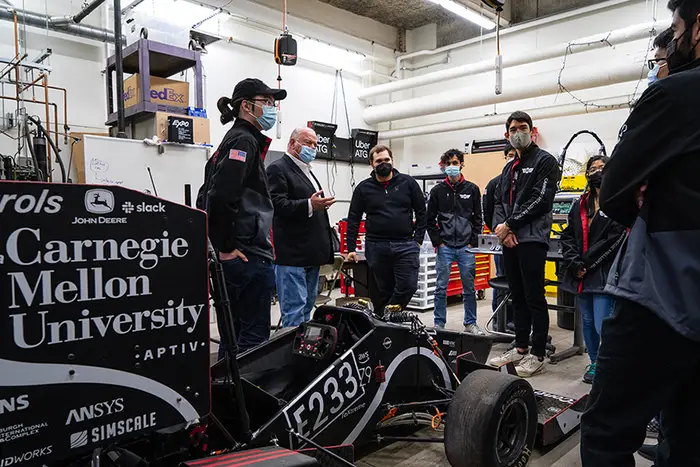 Chip Ganassi talks with students