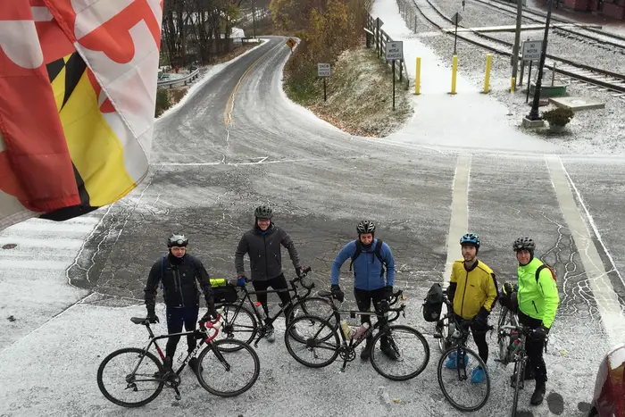 Matt Smith poses with other CNBC members on a bike ride.