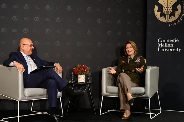 President Jahanian and General Richardson seated on stage