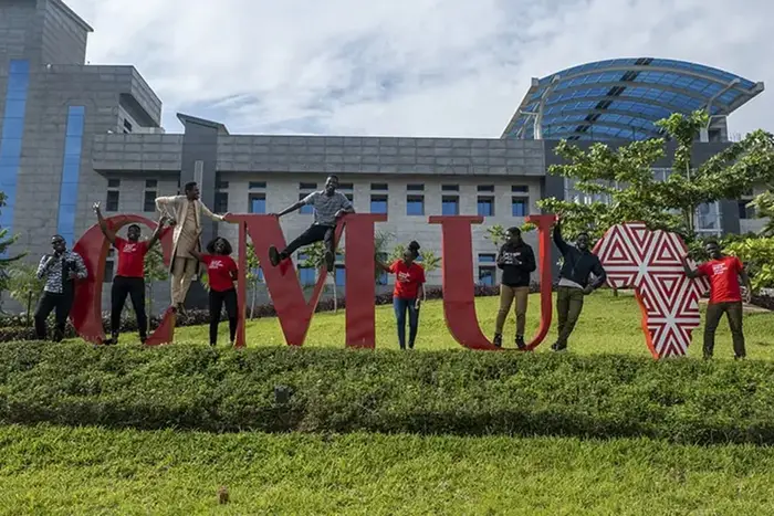 students with CMU letters at CMU Africa