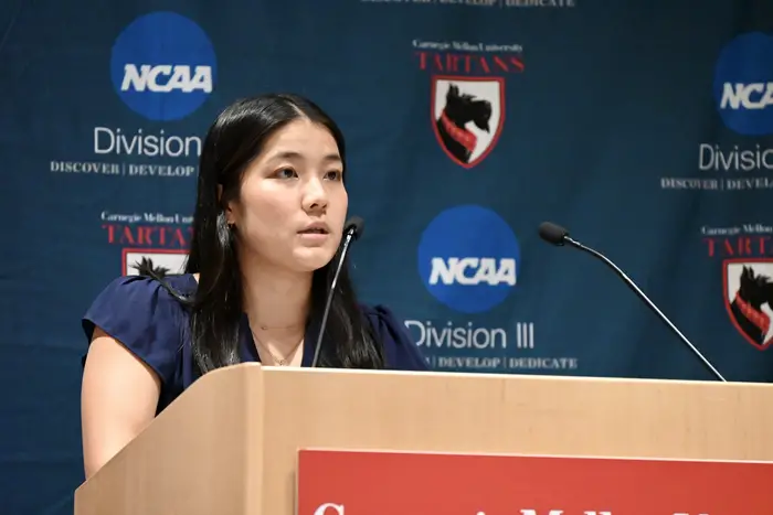 Erica Iizuka behind podium