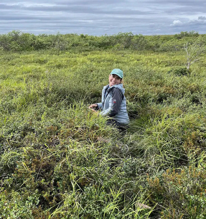 Greta Markey conducting fieldwork while pursuing graduate studies.