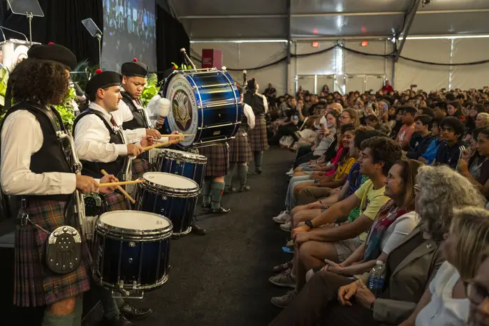 A bagpipe band plays at Convocation.