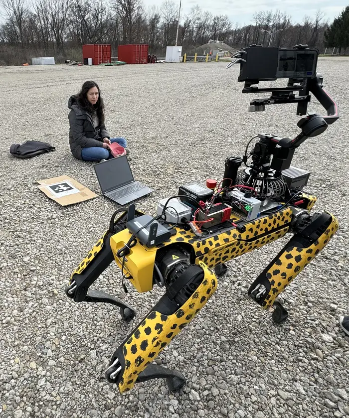 Members of Team Chiron test a robotic system.