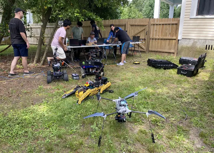 During a test, Team Chiron's robots and drones performed tasks to assess the medical status of casualties in a simulated environment.