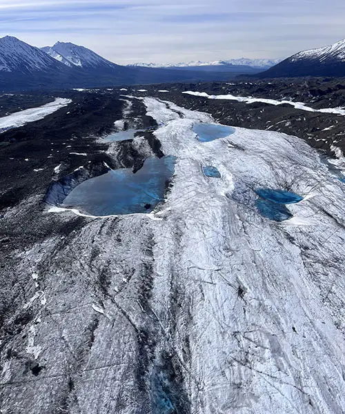 Supraglacial lakes, formed from meltwater, on Kennicott Glacier. 