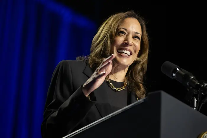 Kamala Harris speaks at a podium.