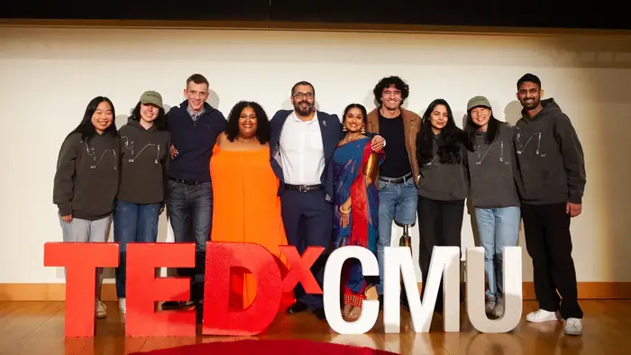 Members of the TEDxCMU speaker curation team and visiting speakers, including Streisfeld (second from left) and Angus Fletcher (third from left)