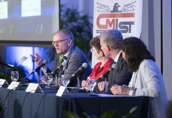Benedikt Wechsler speaks on a panel