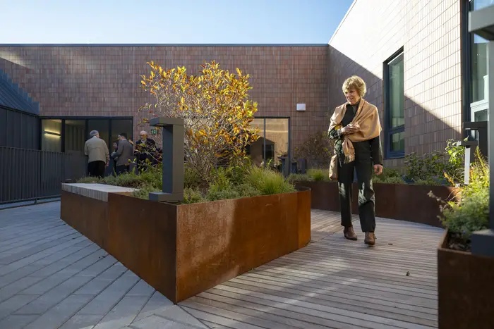 Attendees tour the Wellness Garden.