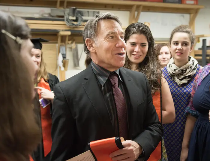 Stephen Schwartz surrounded by students. 