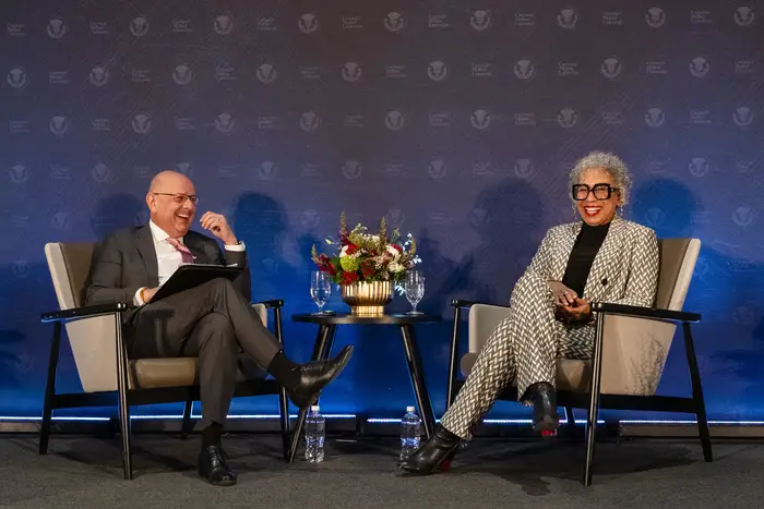 Farnam Jahanian and Tamara Tunie seated on stage