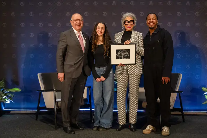 Farnam Jahanian, Tamara Tunie and students from the School of Drama on stage