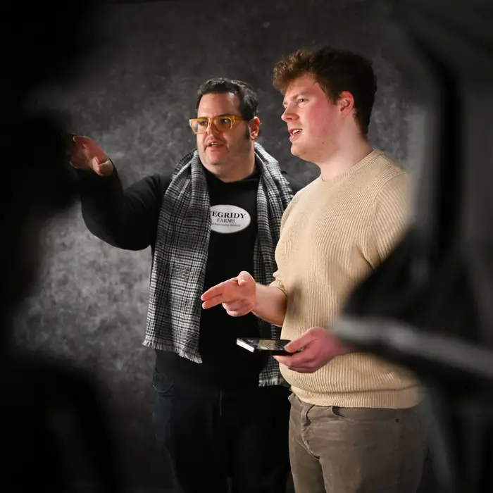 Josh gad stands with an acting student