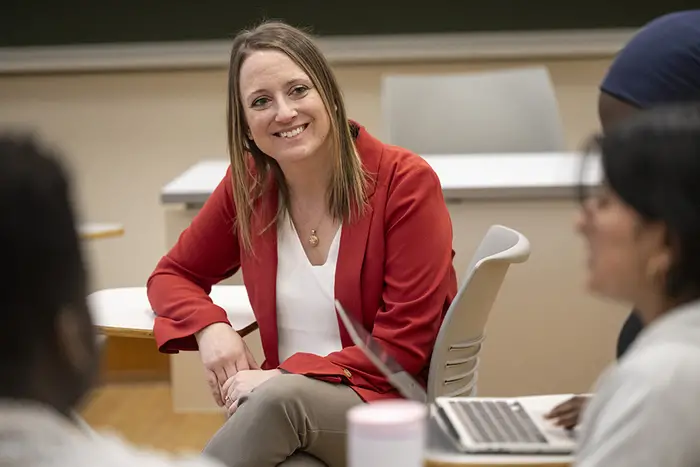 Kimberly Piatt listens to a student