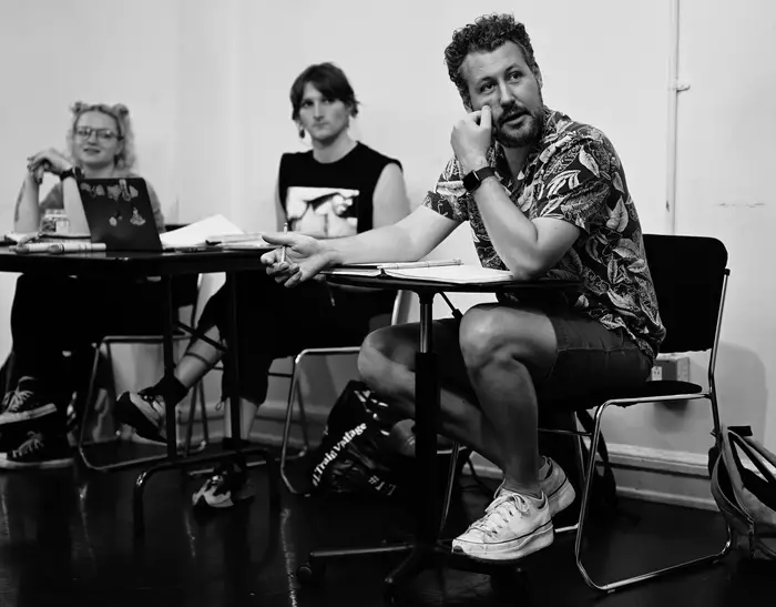 Benjamin Viertel, at right, in discussion during production. 