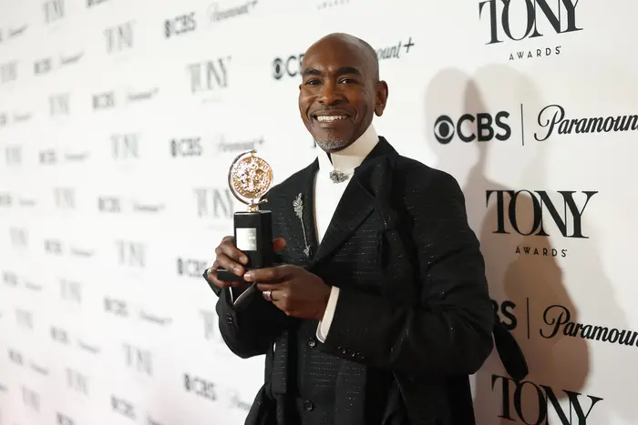 Paul Tazewell poses with the Best Costume Design of a Musical award for "Death Becomes Her" in The 78th Annual Tony Awards Media Room presented by Carnegie Mellon University.