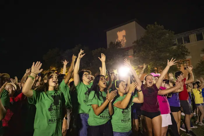Students jump and cheer during Playfair.