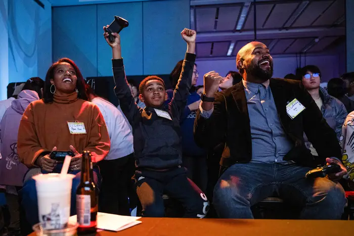 ETC director Derek Ham, at right, playing games at their Fall Festival. 