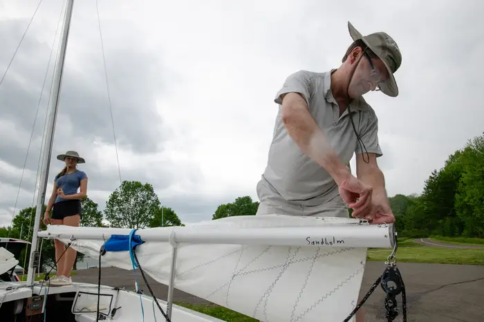 Tuomas Sandholm and his daughter Annika prepare a sailboat. 