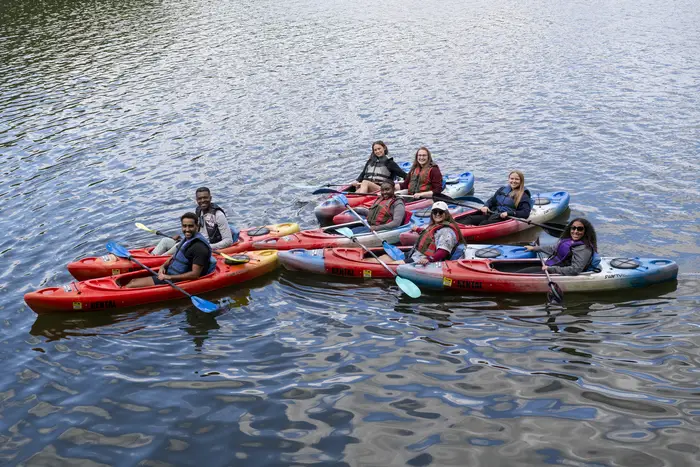 Tagbo Niepa takes students out on the water on kayaks.