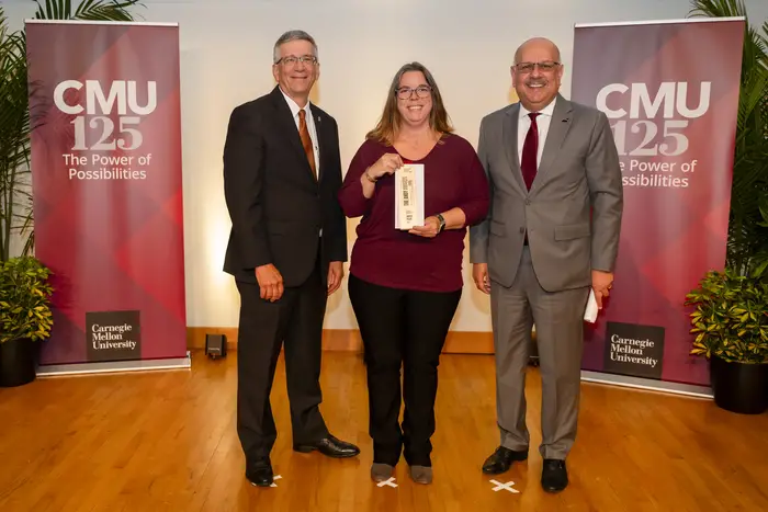 Kaycee Palko (center) receives her Andy Award