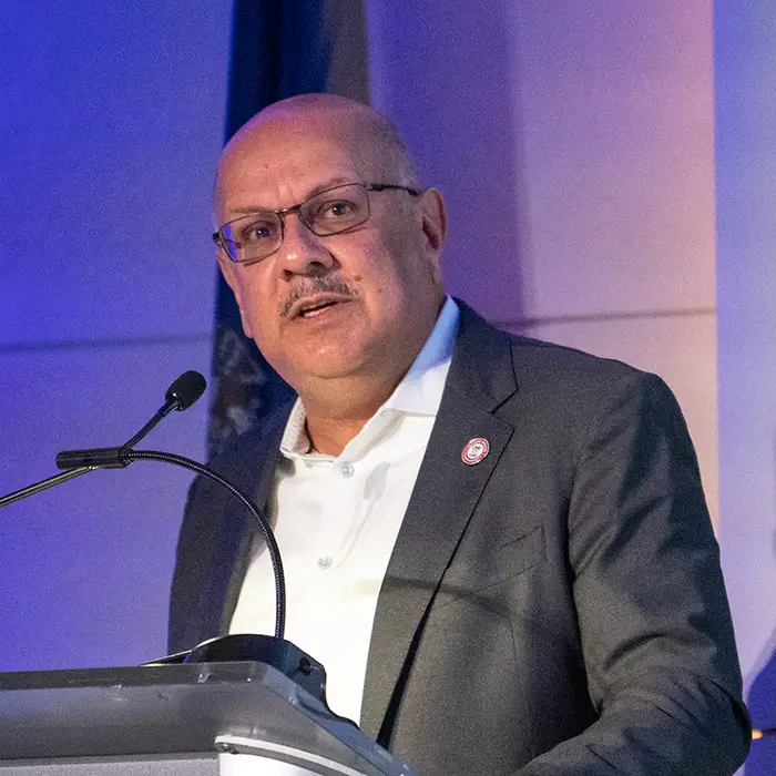 President Farnam Jahanian introduces Governor Josh Shapiro during the Council on Competitiveness and the Global Federation of Competitiveness Councils (GFCC) event.