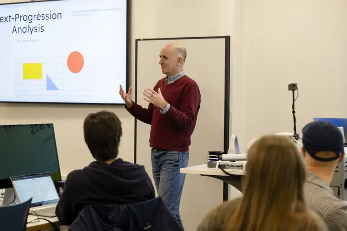 David Brown, associate teaching professor of English, instructs students in Coding for Humanists