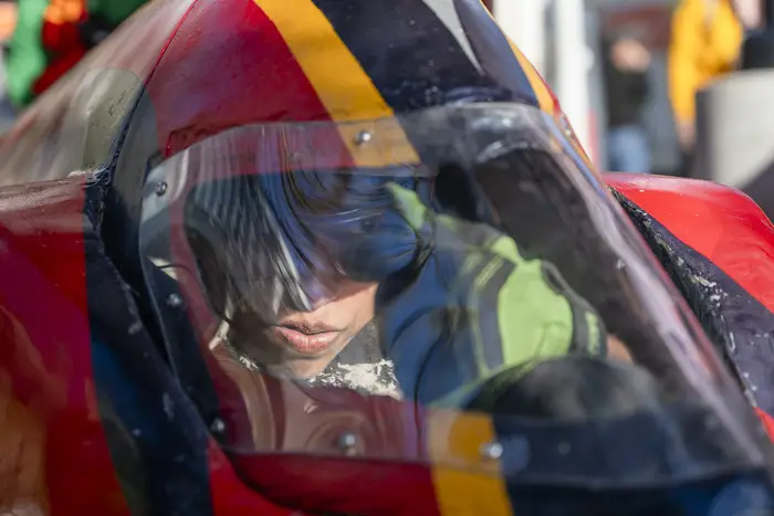 A student drives a Buggy. 