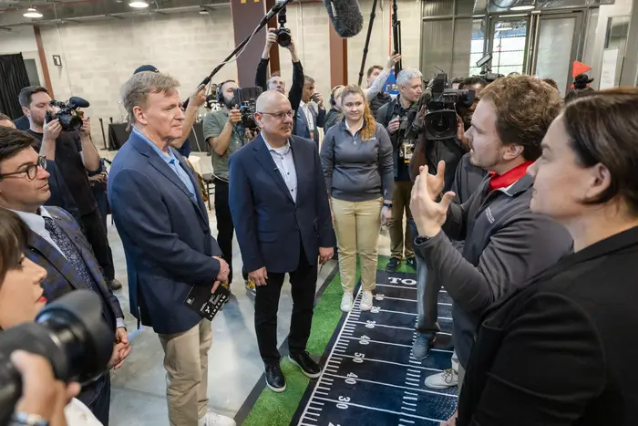 CMU researchers talk to NFL Commissioner Roger Goodell. 