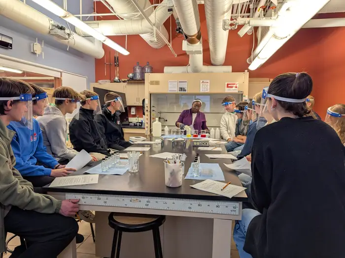 Teaching Professor Gizelle Sherwood visits a high school class in Erie, PA.