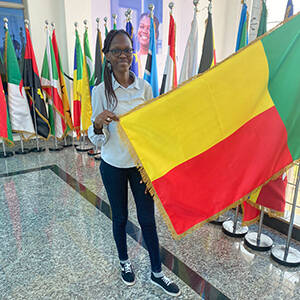 student holding flag