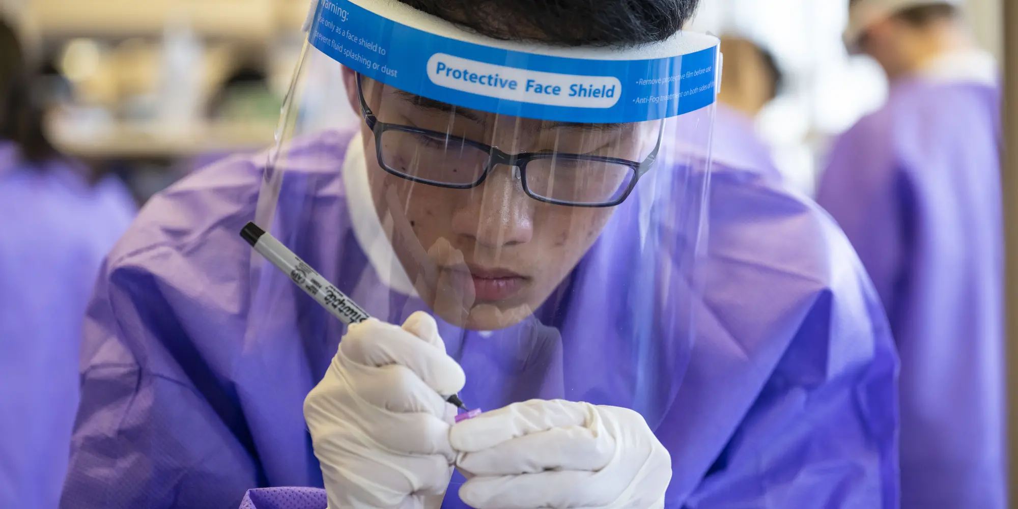 Students works in a lab led by Assistant Teaching Professor Joshua Kangas during the Pre-College Program in Computational Biology.