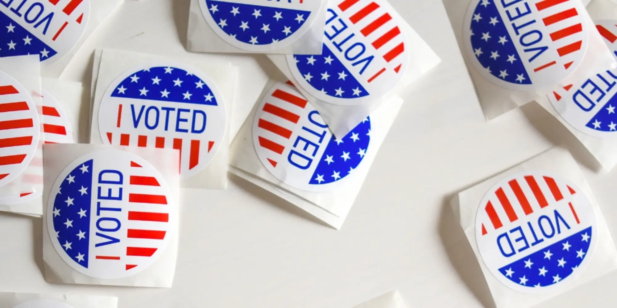 Voting stickers on a table.