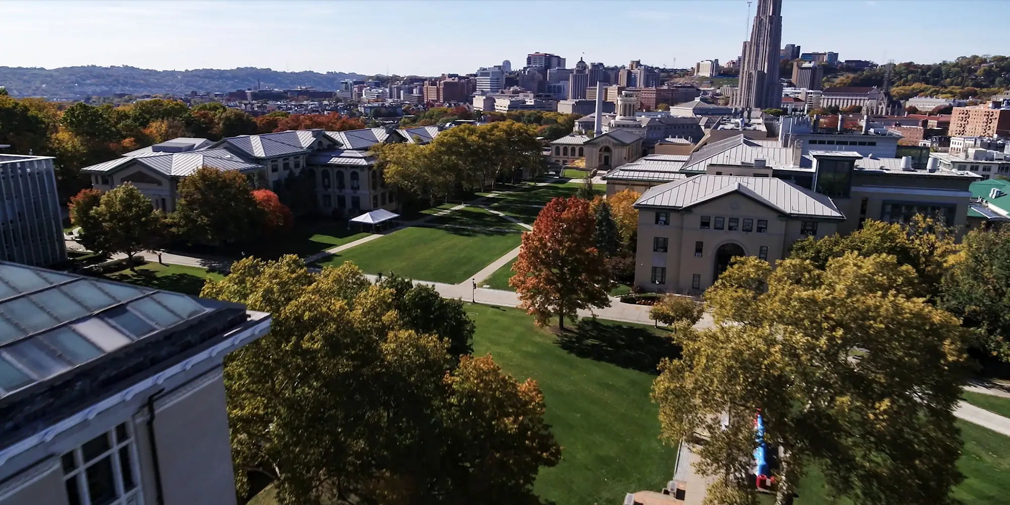 fall campus aerial shot with Cathedral of Learning in background