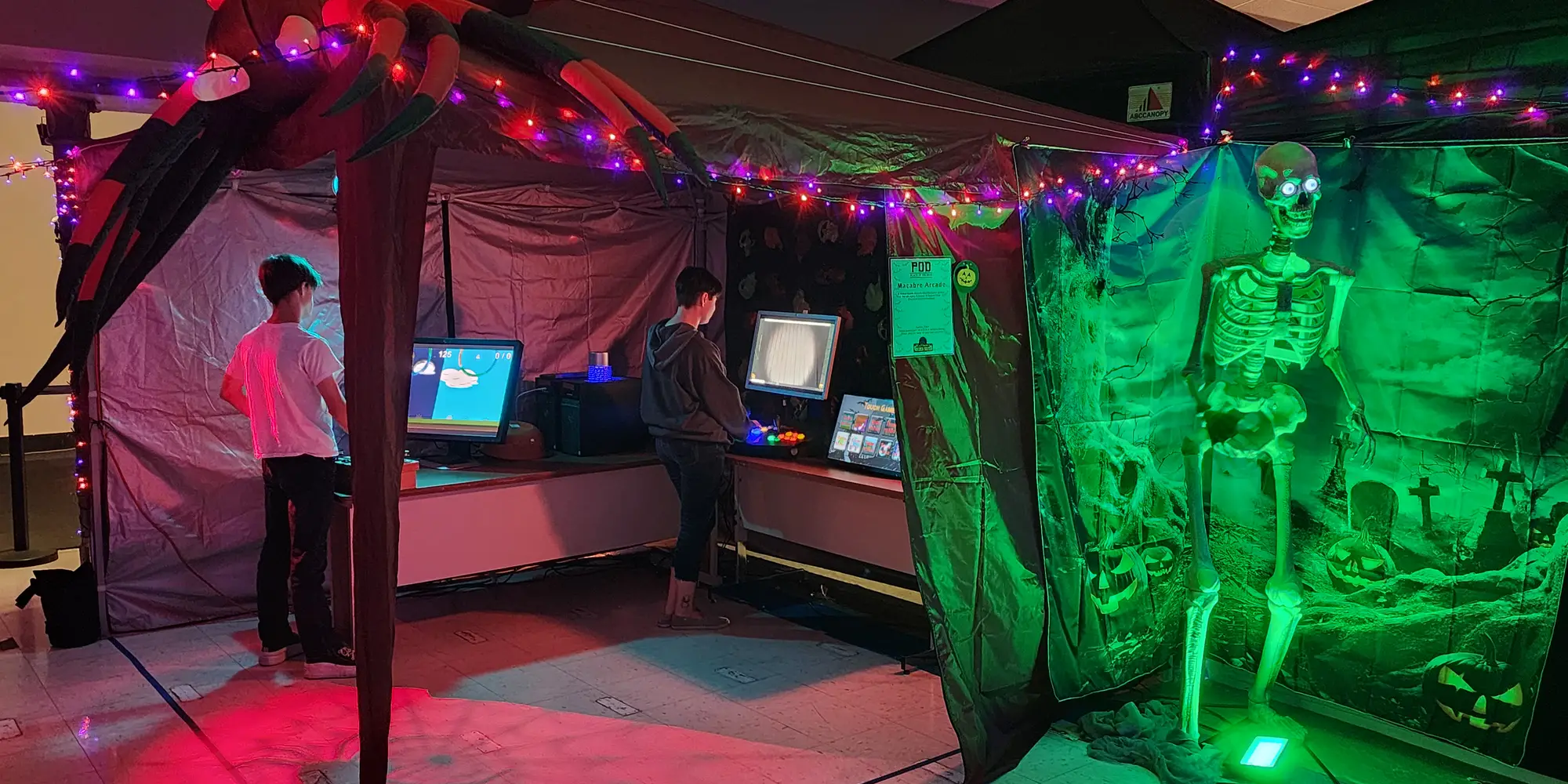 A crew works to build attractions at a Halloween festival.