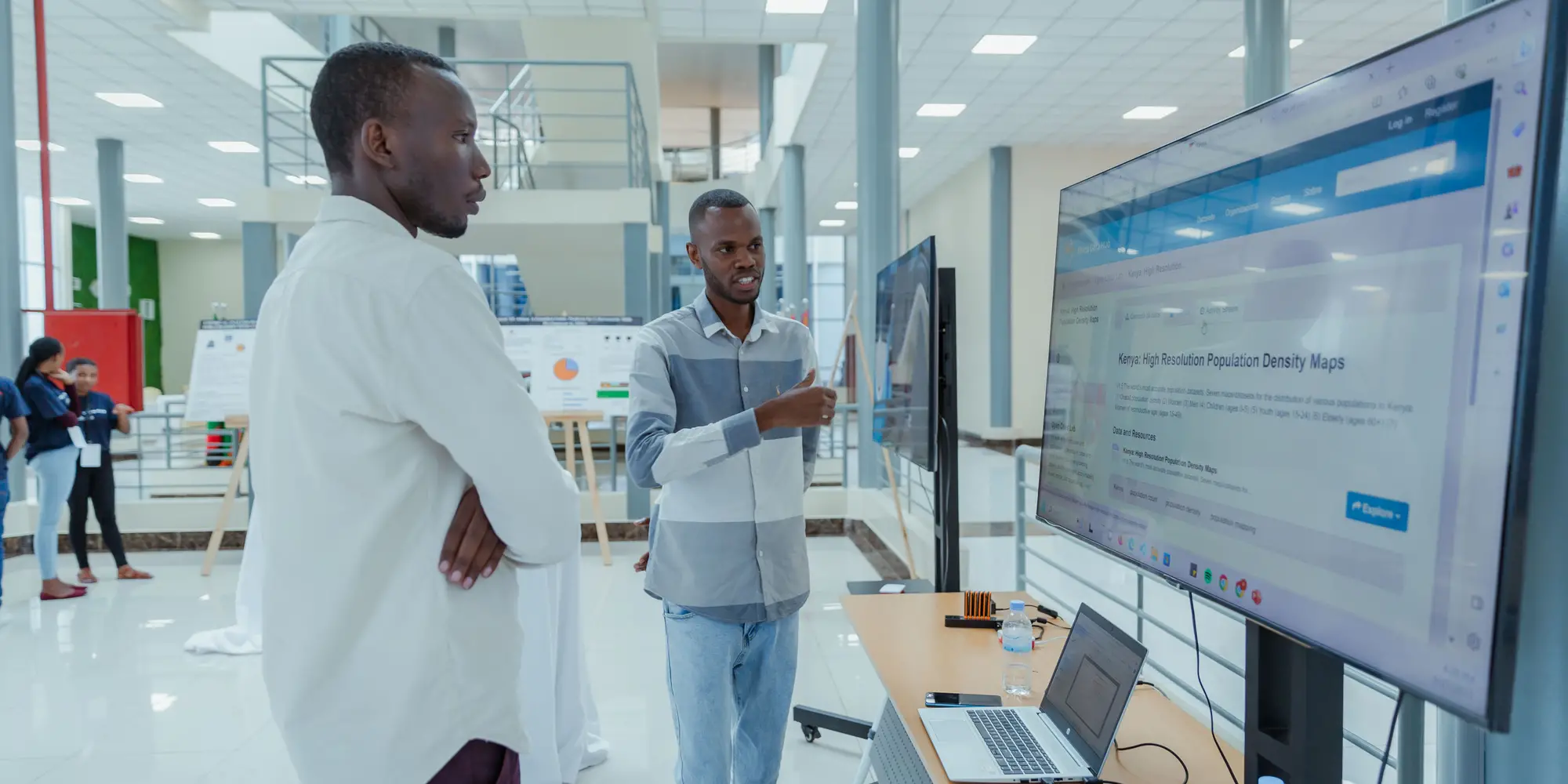 Students looking at a computer screen. 