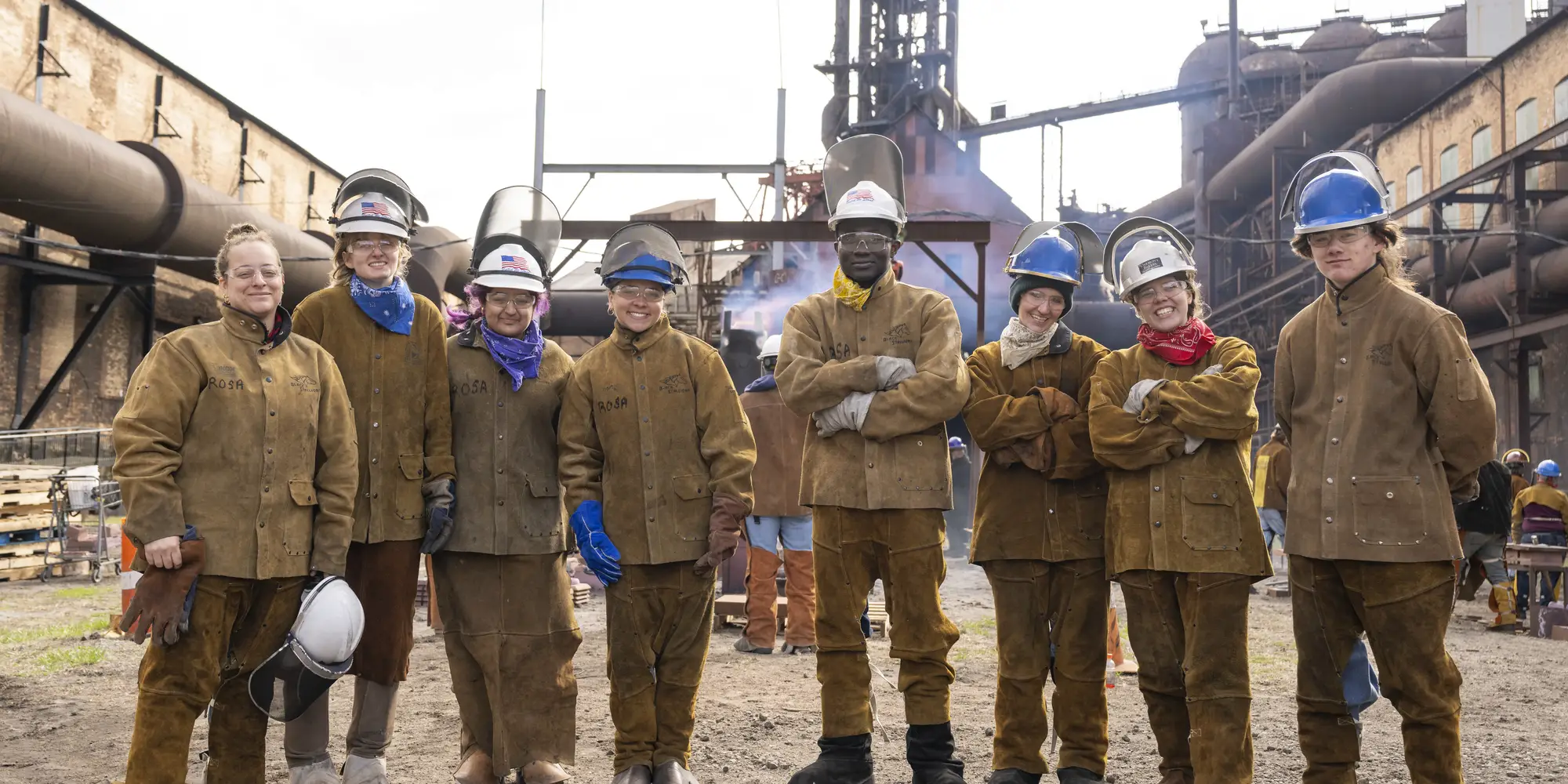 A group photo of students at the Carrie Furnace.
