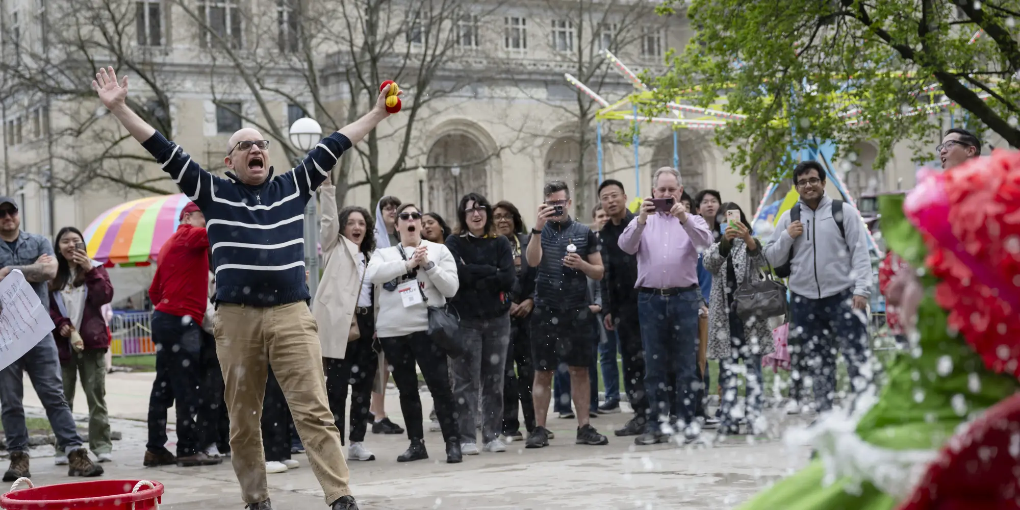 A thrower cheers at Douse-A-Dean.