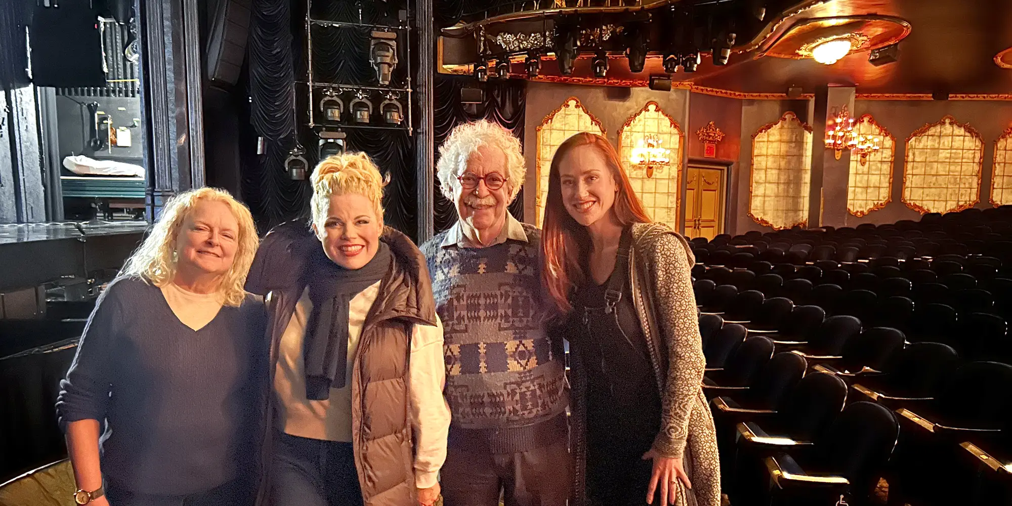 A group photo in a theater
