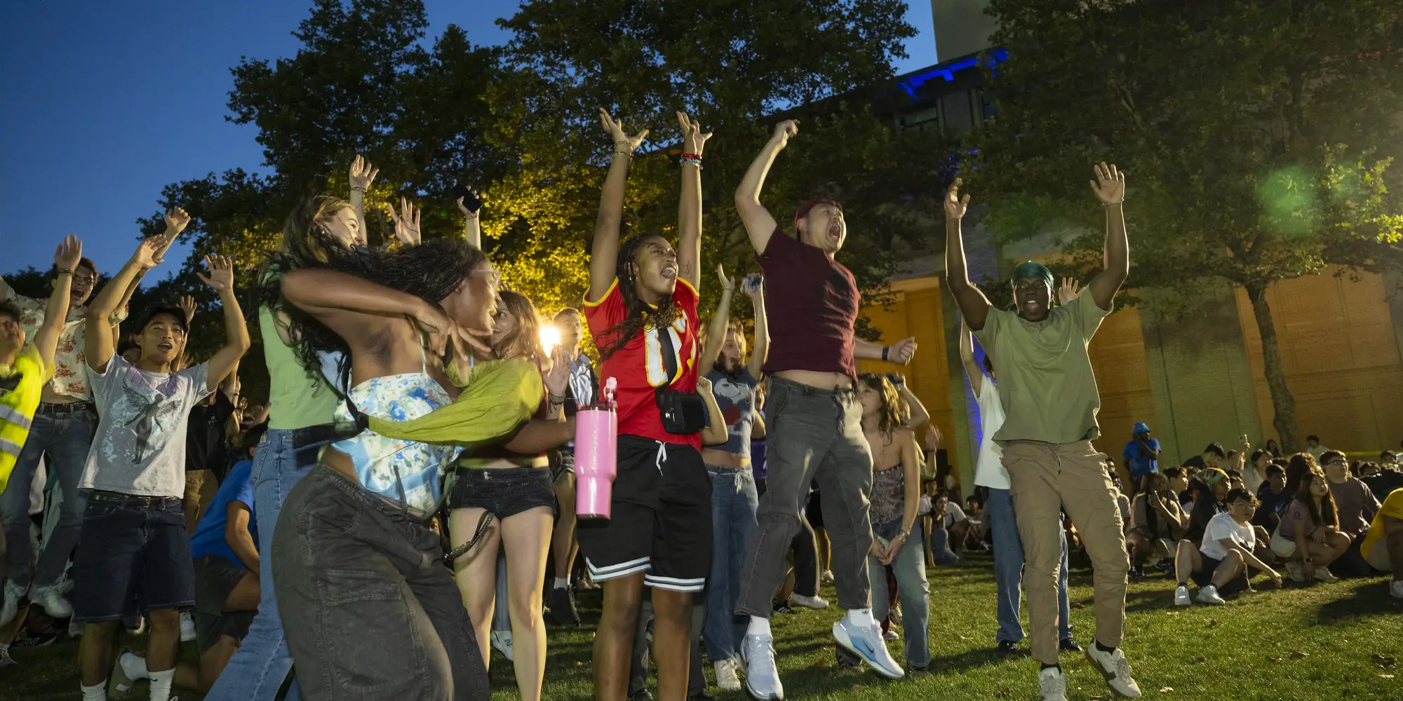 Students jump and cheer at Playfair.