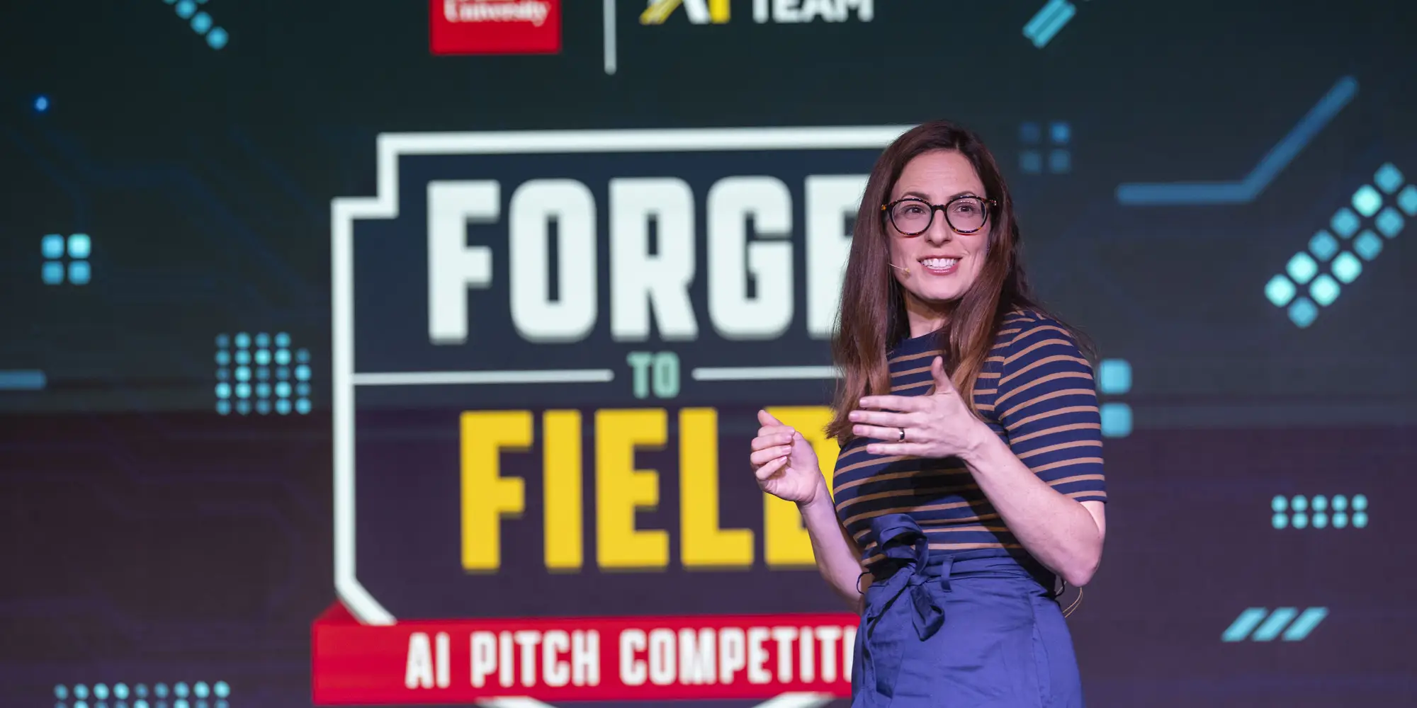 Meredith Meyer Grelli kicks off the pitch competition at the “Powering the Future of Sport: A Draft Week Showcase and AI Pitch Competition”, on April 22, 2026 at the Robotics Innovation Center in Hazelwood Green.