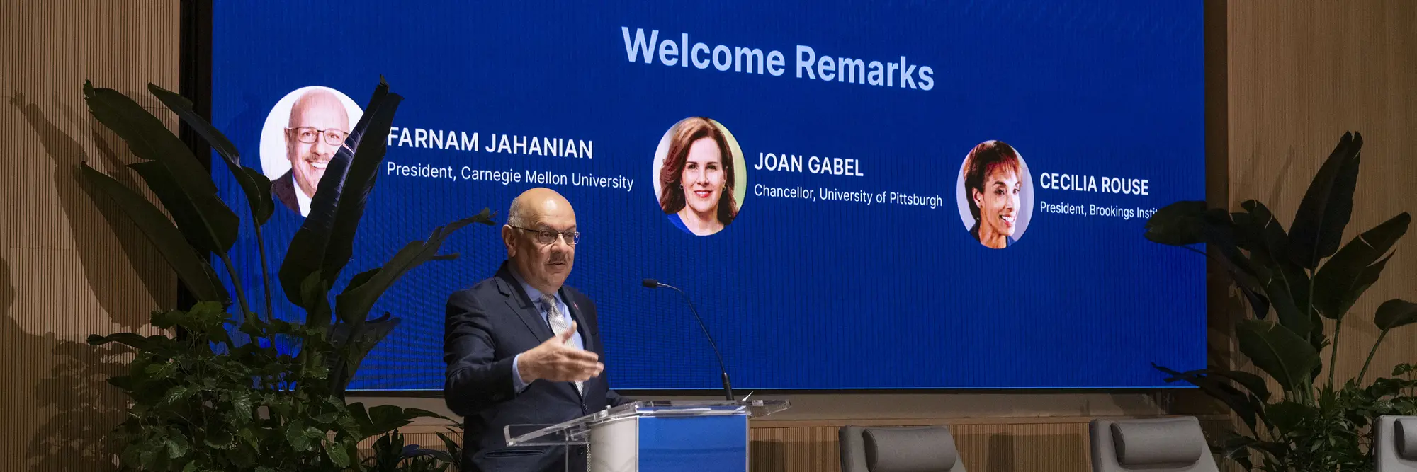 Farnam Jahanian speaks at a podium.