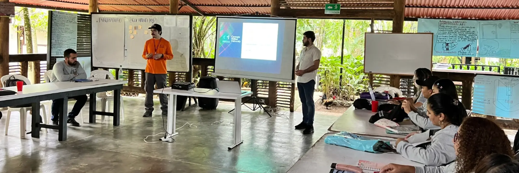 Mateo Dulce Rubio presents in a large, open room.