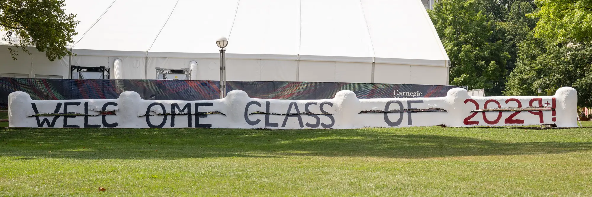 The CMU Fence, reading Welcome Class of 2029+!