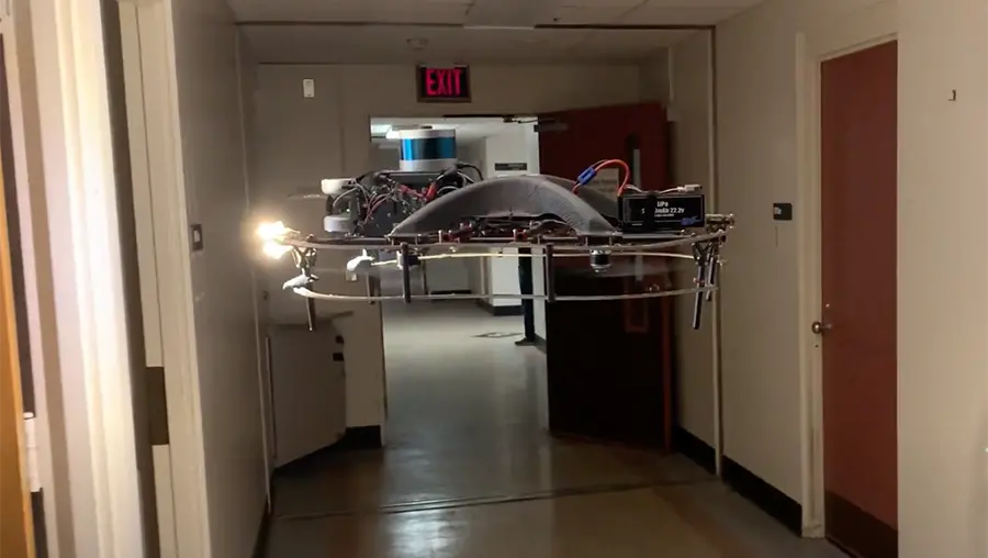 Robot flying in a hallway