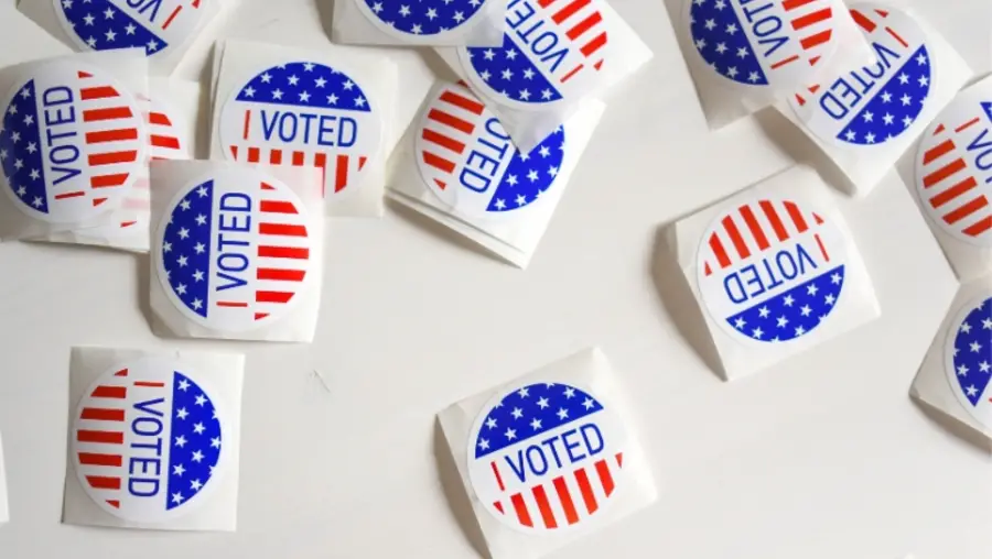 Voting stickers on a table.