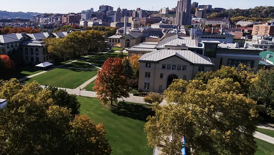 fall campus aerial shot with Cathedral of Learning in background