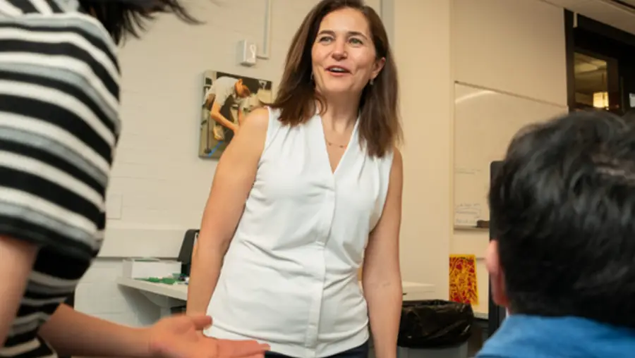 Burcu Akinci speaks with students